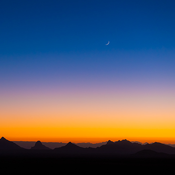 Crescent moon over the Zagros mountains.